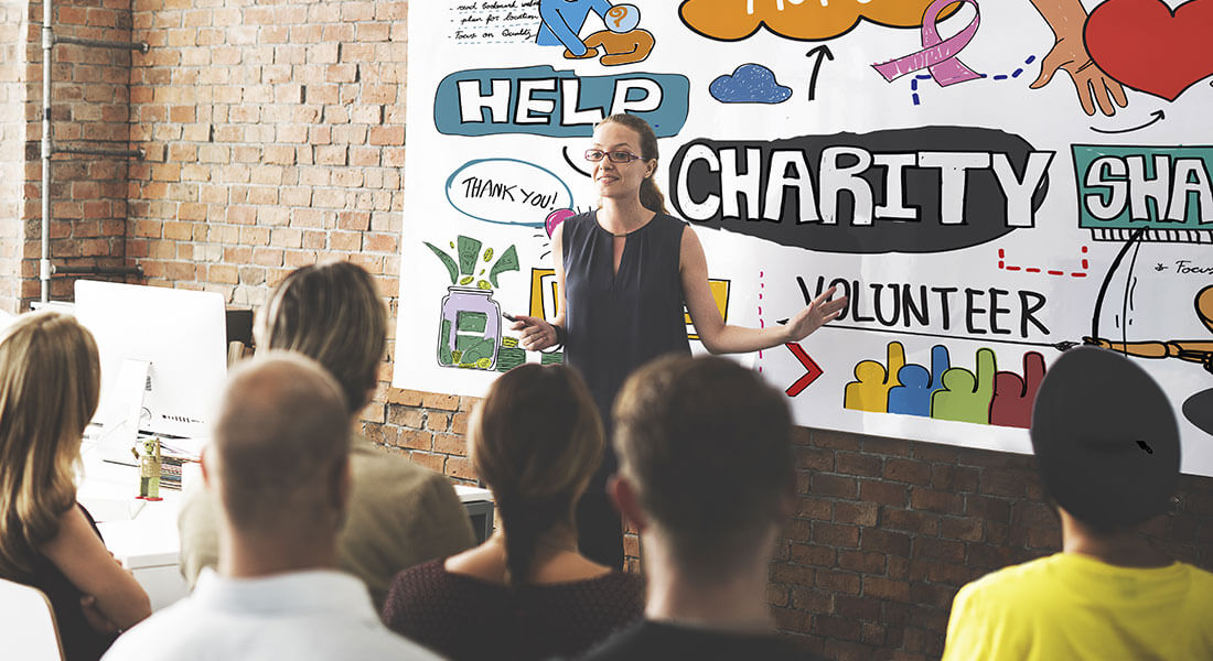 Charity conference with banner